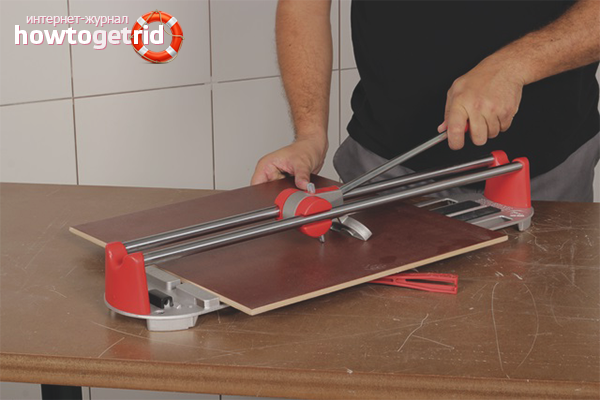 How to cut tiles with a manual tile cutter