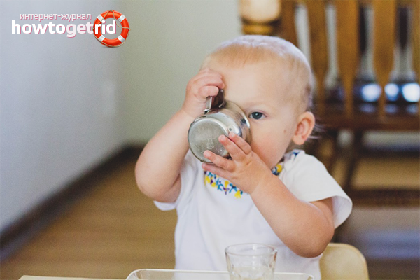 Child drinks from a mug